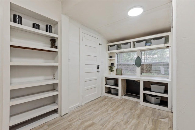 mudroom with light hardwood / wood-style floors