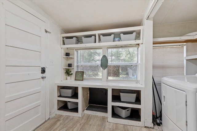 interior space featuring light wood-type flooring and washer / clothes dryer