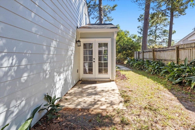 property entrance featuring french doors