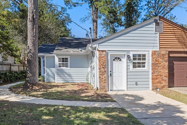 ranch-style house featuring a garage