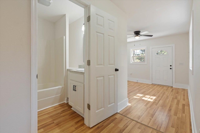 hallway featuring light hardwood / wood-style floors