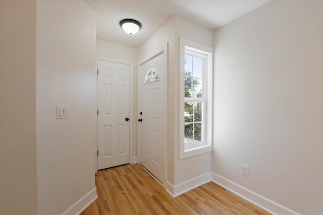 foyer entrance featuring light wood-type flooring