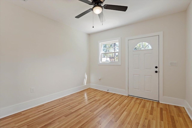 entryway with ceiling fan and light hardwood / wood-style floors