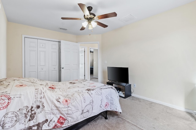 bedroom featuring a closet, ceiling fan, and carpet flooring