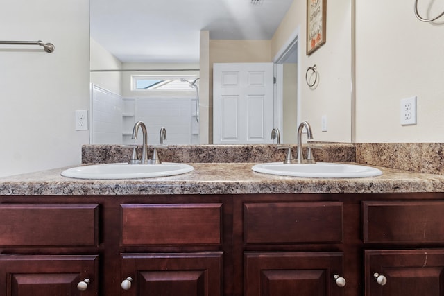 bathroom featuring vanity and walk in shower