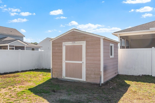 view of outdoor structure featuring a yard