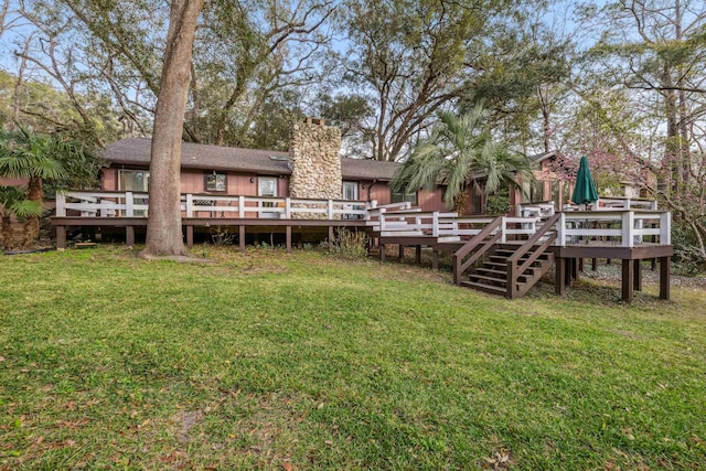 view of yard with a deck
