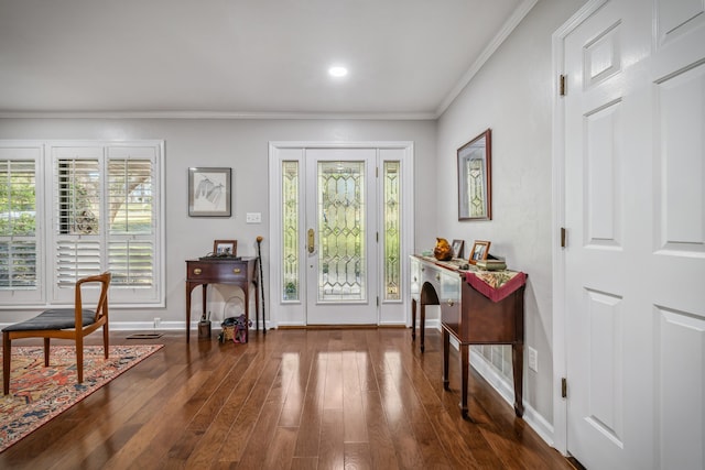 entryway featuring baseboards, dark wood-style flooring, and ornamental molding