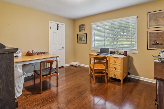 home office with dark wood finished floors and baseboards