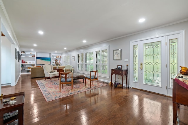 living area featuring recessed lighting, baseboards, hardwood / wood-style floors, and crown molding