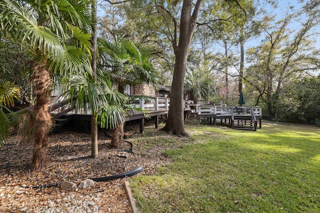 view of yard featuring a deck