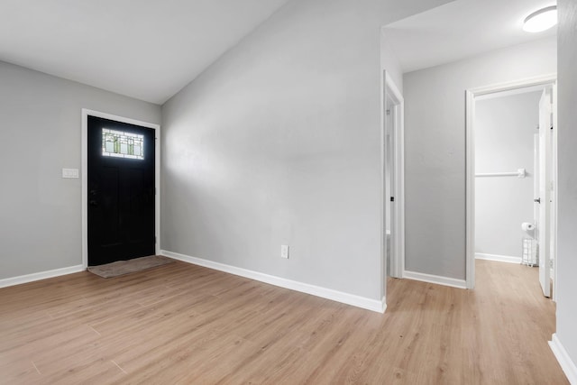 3146 Oak Hammock Ln, Tallahassee, FL 32301 - entryway featuring light wood finished floors, baseboards, and lofted ceiling