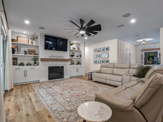 195 Coe Landing Rd, Tallahassee, FL 32310 - living area featuring recessed lighting, light wood-type flooring, a fireplace, visible vents, and a ceiling fan