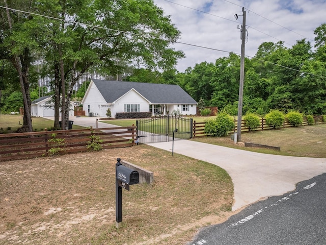 195 Coe Landing Rd, Tallahassee, FL 32310 - ranch-style house featuring a gate, a front lawn, a fenced front yard, and concrete driveway