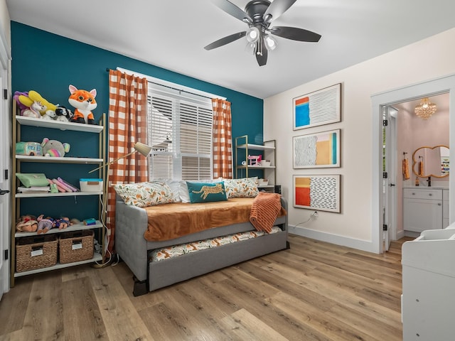 195 Coe Landing Rd, Tallahassee, FL 32310 - bedroom featuring wood finished floors, ceiling fan, heating unit, and baseboards