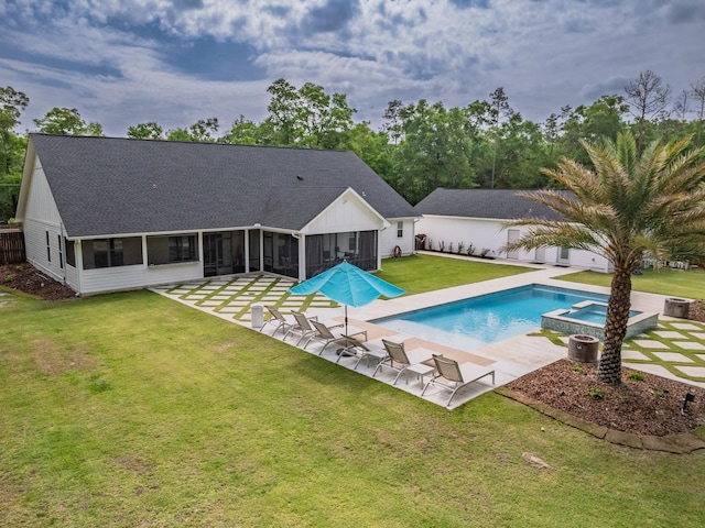 195 Coe Landing Rd, Tallahassee, FL 32310 - rear view of property with a yard, a shingled roof, a patio, a sunroom, and a pool with connected hot tub