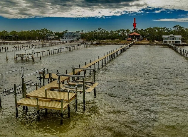 view of dock with a water view