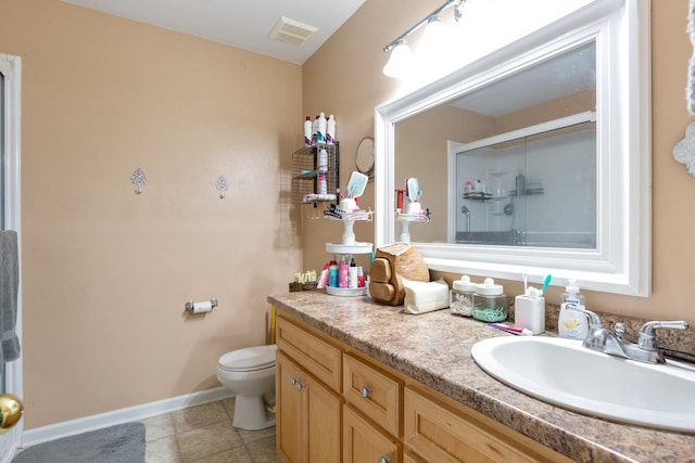 bathroom with toilet, an enclosed shower, vanity, and tile patterned floors