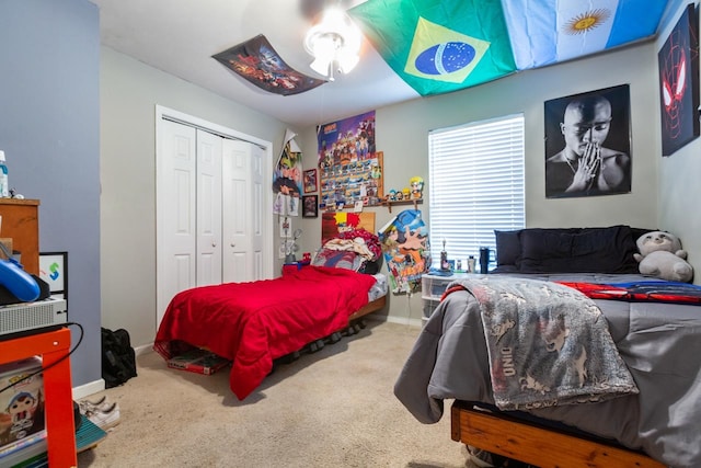 bedroom featuring a closet and carpet floors