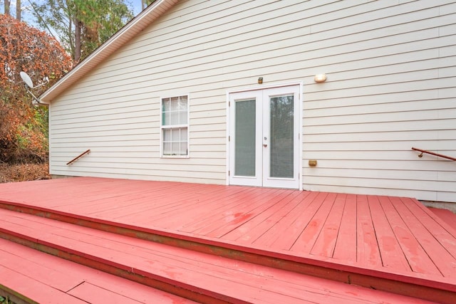 wooden deck featuring french doors