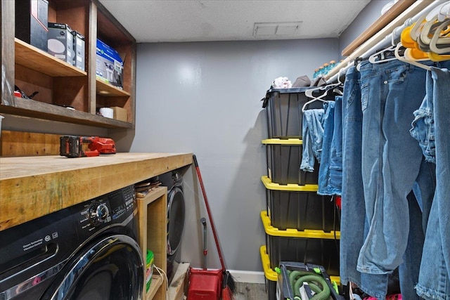 127 E Nancy St, Perry, FL 32347 - storage with visible vents and washing machine and clothes dryer
