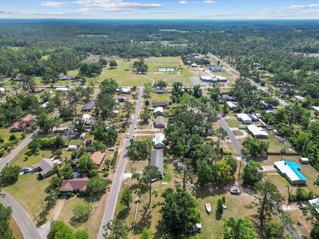 127 E Nancy St, Perry, FL 32347 - drone / aerial view with a wooded view