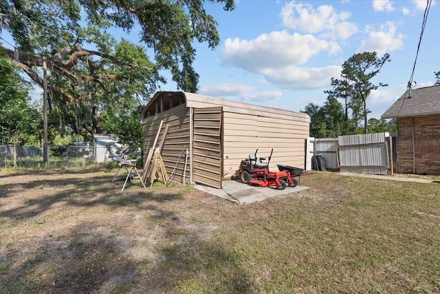 127 E Nancy St, Perry, FL 32347 - view of outbuilding featuring a fenced backyard
