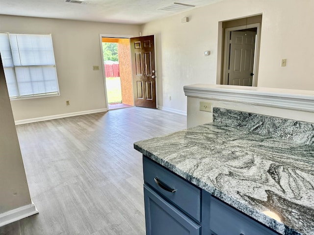 3180 N Ridge Rd -, Unit Tallahassee, FL 32305 - interior space featuring baseboards, visible vents, and light wood-style flooring