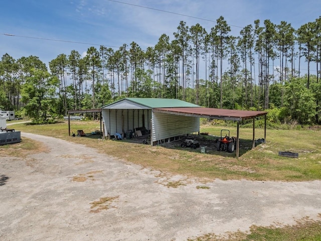 881 Hickory Hammock Rd, Carrabelle, FL 32322 - view of outbuilding with a detached carport and driveway