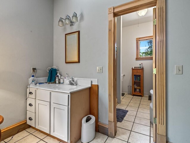 881 Hickory Hammock Rd, Carrabelle, FL 32322 - bathroom with tile patterned floors, vanity, and baseboards