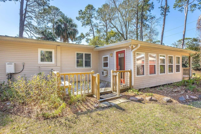 253 Prado St, Apalachicola, FL 32320 - view of front of house featuring a deck