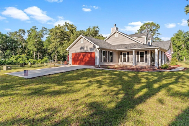 1094 Paul Thompson Rd, Monticello, FL 32344 - view of front of property featuring a garage, driveway, a front lawn, a porch, and roof with shingles