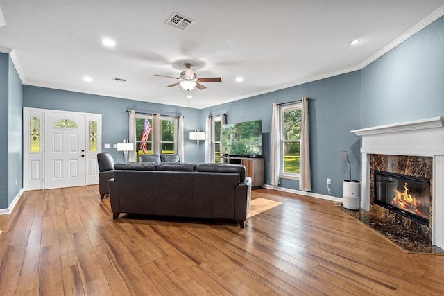 1094 Paul Thompson Rd, Monticello, FL 32344 - living area featuring ornamental molding, a high end fireplace, ceiling fan, hardwood / wood-style floors, and recessed lighting