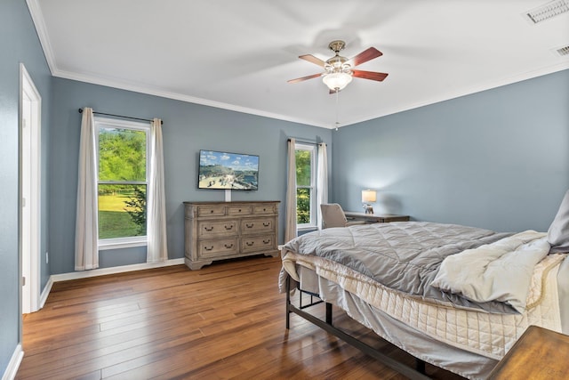 1094 Paul Thompson Rd, Monticello, FL 32344 - bedroom featuring wood-type flooring, ornamental molding, baseboards, and ceiling fan
