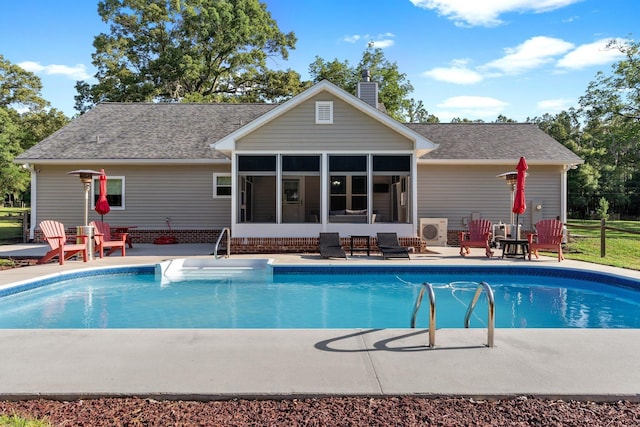 1094 Paul Thompson Rd, Monticello, FL 32344 - swimming pool with a sunroom and a patio
