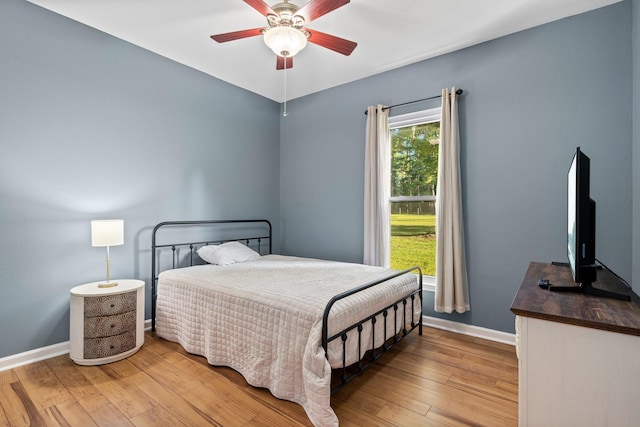 1094 Paul Thompson Rd, Monticello, FL 32344 - bedroom featuring light wood-style flooring, baseboards, and ceiling fan