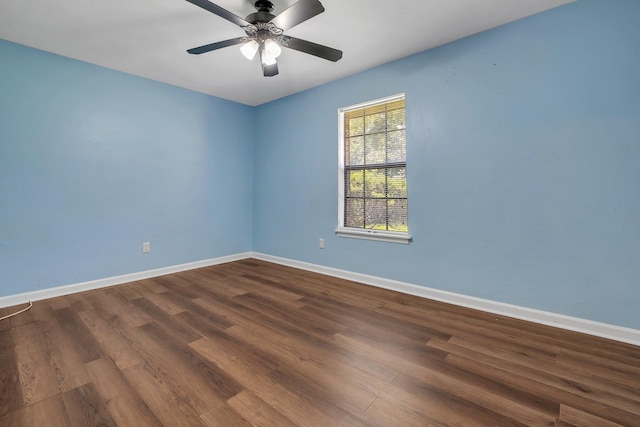 4054 Mcleod Dr, Tallahassee, FL 32303 - empty room featuring dark wood-style flooring and ceiling fan