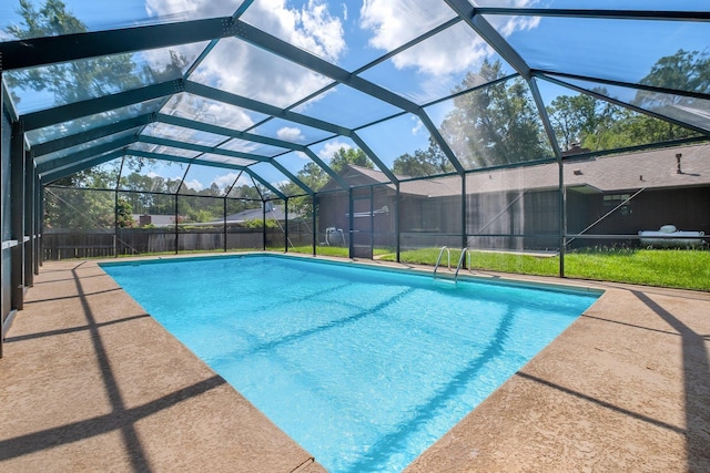 4054 Mcleod Dr, Tallahassee, FL 32303 - swimming pool with a patio and glass enclosure