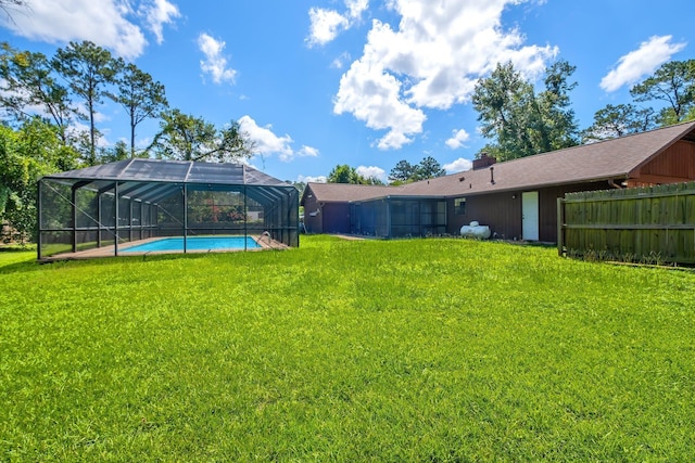 4054 Mcleod Dr, Tallahassee, FL 32303 - view of yard with an outdoor pool and glass enclosure