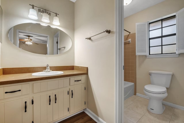 4054 Mcleod Dr, Tallahassee, FL 32303 - full bath featuring vanity, ceiling fan, tile patterned floors, and shower / tub combination