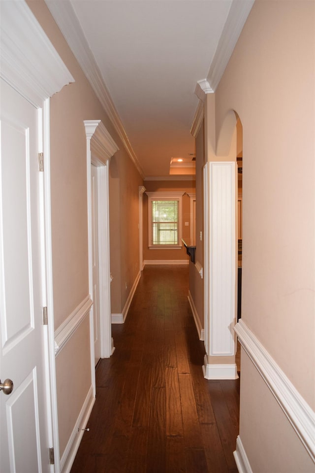 5657 Jacksons Gap Rd, Tallahassee, FL 32317 - corridor featuring arched walkways, dark wood-type flooring, and ornamental molding