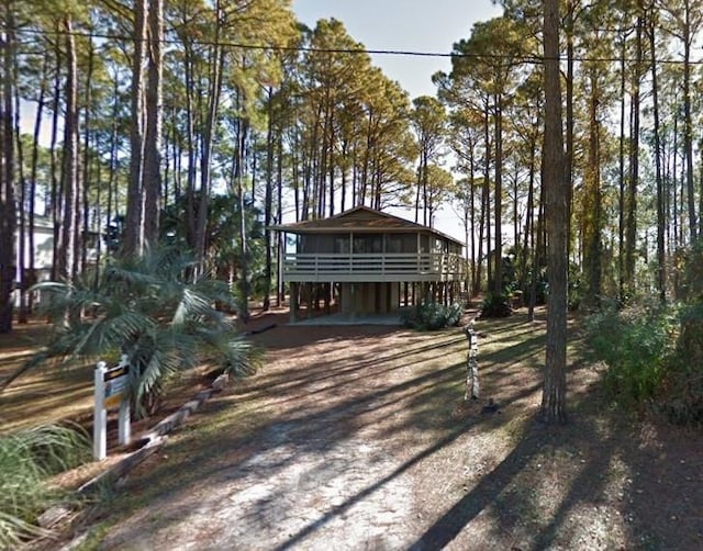 view of front of house featuring a wooden deck
