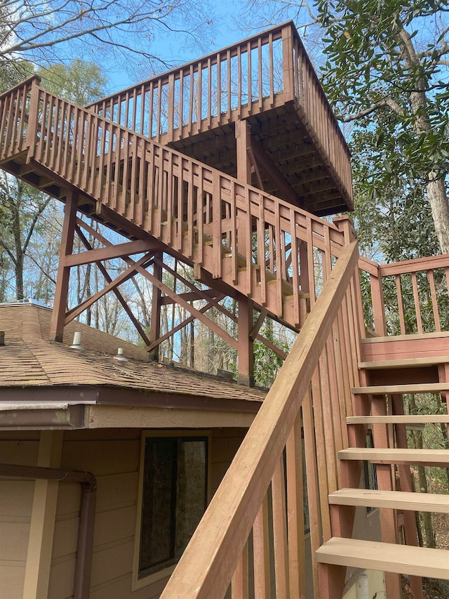 wooden deck featuring stairs