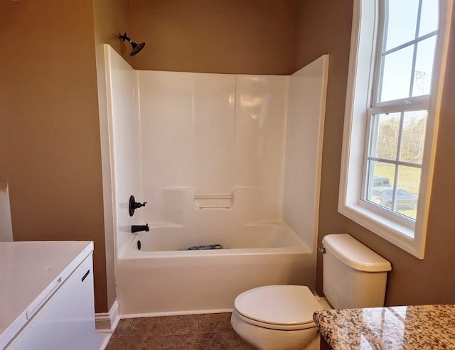 full bathroom featuring shower / bathtub combination, vanity, and toilet