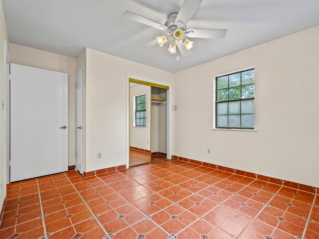 empty room featuring ceiling fan