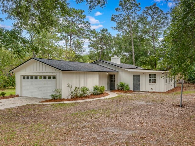 ranch-style home with a garage