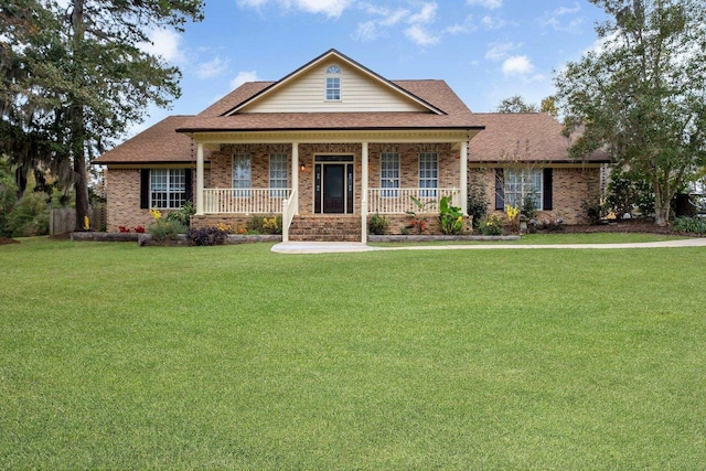 view of front facade with a porch and a front yard