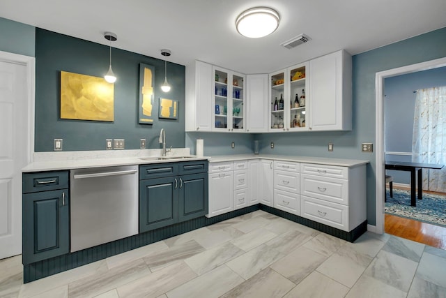 kitchen with white cabinetry, decorative light fixtures, dishwasher, and sink