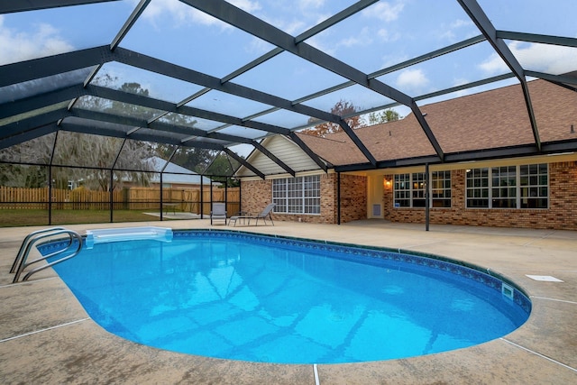 view of pool featuring a patio and a lanai