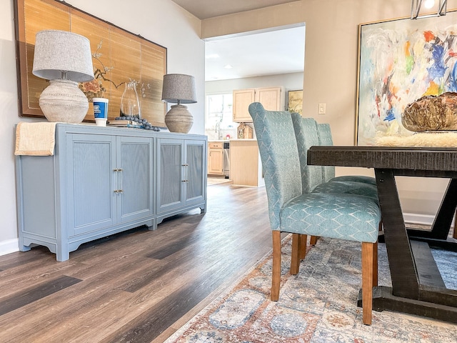 dining space featuring wood finished floors